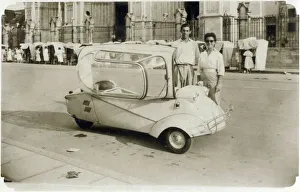A young (possibly) Italian couple standing proudly next to their Messerschmitt KR200 A young (possibly) Italian couple standing proudly next to their Messerschmitt KR200