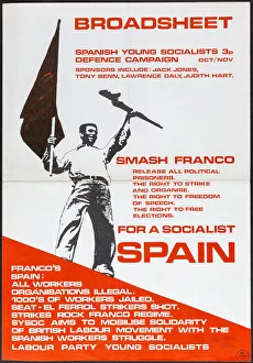 Young Spanish socialist with gun and flag Young Spanish socialist with gun and flag
