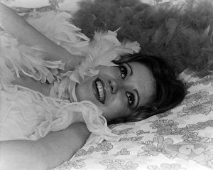 Young woman in a frilly white negligee Young woman in a frilly white negligee