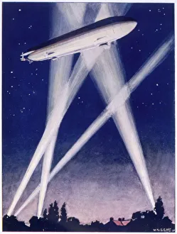 <b class=qtipBold><figcaption>ZEPPELIN RAIDER/1915-16</figcaption></b><br>A Zeppelin raider is caught in the searchlights over the countryside<br><em>© Mary Evans Picture Library</em> ZEPPELIN RAIDER/1915-16