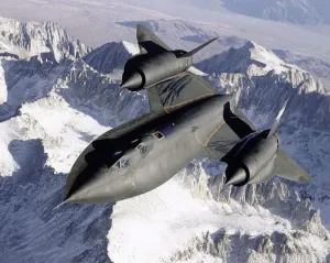 California Prints: SR-71 Print: A high-speed aircraft slices across snowy mountains