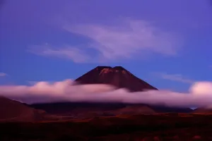 North Island Prints: Mt Ngauruhoe Peak Emerging from Clouds at Dusk Print