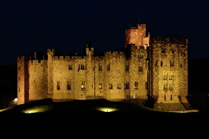 Alnwick Castle - illuminated at night-time Alnwick Castle - illuminated at night-time