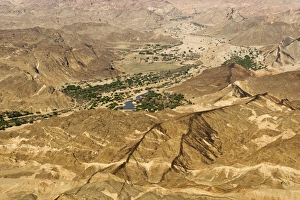 Black dolerite dykes spread through the Moon Valley Landscape - The Swakop River with its Black dolerite dykes spread through the Moon Valley Landscape - The Swakop River with its