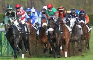 Horse Racing Prints: LA-3594 Print of Riders and Racehorses Galloping around a Track