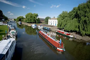 Canal boats on the River Ouse, Ely, Cambridgeshire, England Canal boats on the River Ouse, Ely, Cambridgeshire, England