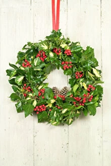 Decorations Collection: Christmas Wreath on old white painted door