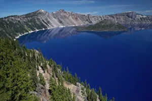 Crater Lake showing Wizard Island (volcanic cone) Lake is 1, 943 feet deep, deepest in the USA Crater Lake showing Wizard Island (volcanic cone) Lake is 1, 943 feet deep, deepest in the USA