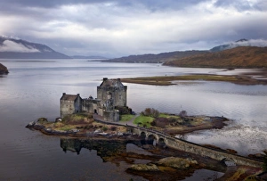 Eilean Donan Castle - with view of Loch Alsh and mountains in the backround - November Eilean Donan Castle - with view of Loch Alsh and mountains in the backround - November