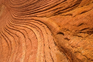 Escalante cross-bedding - intricately overlapping layers of red sandstone create an Escalante cross-bedding - intricately overlapping layers of red sandstone create an