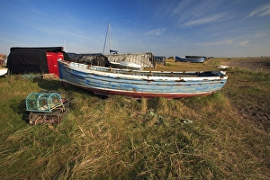 Fishing Boats and Lobster Traps - on Lindisfarne beach Fishing Boats and Lobster Traps - on Lindisfarne beach
