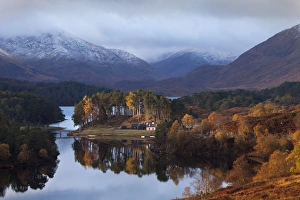 Glen Affric - cottage in early morning sunshine on a calm autumn morning on Loch Affric Glen Affric - cottage in early morning sunshine on a calm autumn morning on Loch Affric