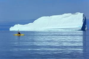 Baffin Gallery: Kayaker tourist kayaking between melting