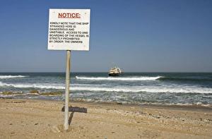 The Kolmanskop Stranded - On rocky reef near Swakopmund, warning notice The Kolmanskop Stranded - On rocky reef near Swakopmund, warning notice