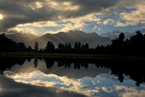 Lake Matheson - perfect reflection of the Southern Alps in Lake Matheson Lake Matheson - perfect reflection of the Southern Alps in Lake Matheson