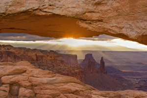 Mesa Arch - View through Mesa Arch into the maze of canyons and rock formations Mesa Arch - View through Mesa Arch into the maze of canyons and rock formations