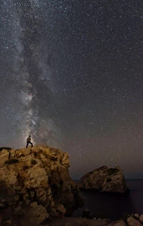 Images Dated 22nd August 2014: Milky Way with man standing on the edge