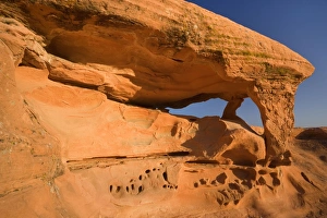 Piano Rock Arch - double arch topped by a huge rock which makes the sandstone formation Piano Rock Arch - double arch topped by a huge rock which makes the sandstone formation