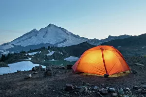Glacial Gallery: Red Big Agnes backpacking tent illuminated at twilight