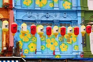 Republic Of Singapore Gallery: Red and yellow Chinese lanterns hanging in front of colo