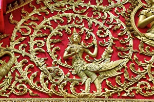 Roof decorations showing a Kinnara at Wat Si Saket Buddh