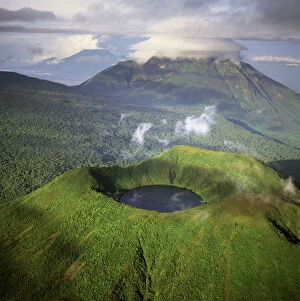 Images Dated 27th February 2006: Rwanda - Aerial view of Africa, Mount Visoke with mount Mikono in background, Virunga Volcanoes