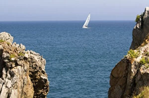 Images Dated 21st July 2009: Sailboat entering the harbor at Castro Urdiales
