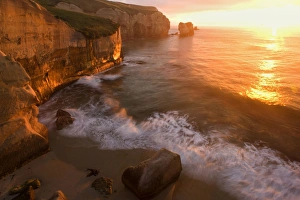 Seascape - view down the rugged coastline at Tunnel Beach with sea stacks Seascape - view down the rugged coastline at Tunnel Beach with sea stacks