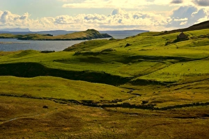 Shetland Scenery - green rolling hills with grazing sheep and view toward St. Magnus Bay Shetland Scenery - green rolling hills with grazing sheep and view toward St. Magnus Bay