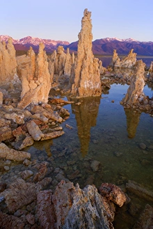 Tufa Formations - reflected in the alkaline waters of Mono Lake with the snow-covered Tufa Formations - reflected in the alkaline waters of Mono Lake with the snow-covered