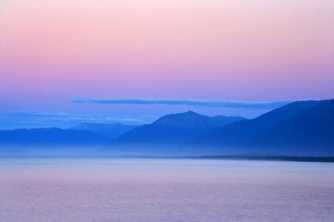 Twilight - ocean and mountains around Jackson Bay at twilight after sunset Twilight - ocean and mountains around Jackson Bay at twilight after sunset