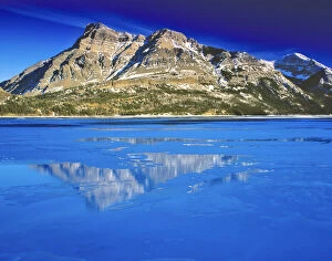 Vimy Peak reflects into Waterton Lake in