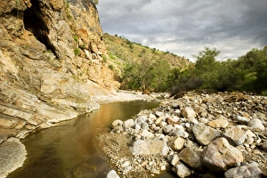 Water flows in the Naukluft Mountains under a stormy sky - Namib Naukluft Park Water flows in the Naukluft Mountains under a stormy sky - Namib Naukluft Park