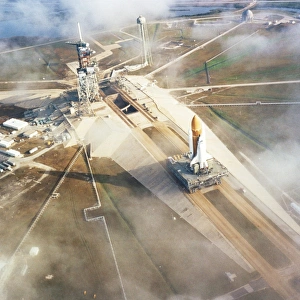 Aerial view of Shuttle STS-6 on way to launchpad Aerial view of Shuttle STS-6 on way to launchpad