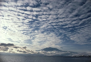 Altocumulus cloud cover over Mt Erebus volcano Altocumulus cloud cover over Mt Erebus volcano