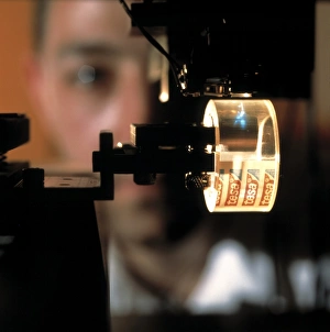 Laser writing optical data onto adhesive tape Laser writing optical data onto adhesive tape