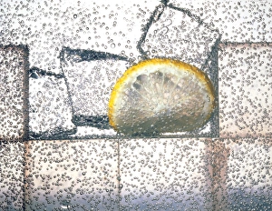 Lemonade: carbonated water drink with ice & lemon Lemonade: carbonated water drink with ice & lemon