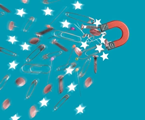 Magnet attracting ferromagnetic objects Magnet attracting ferromagnetic objects
