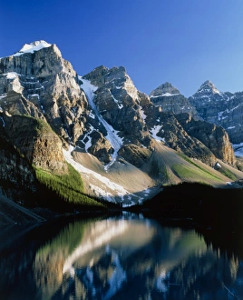 Mountains reflected in Moraine Lake, Canada Mountains reflected in Moraine Lake, Canada