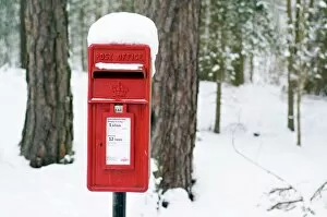 Wintry Collection: Red post box in the snow