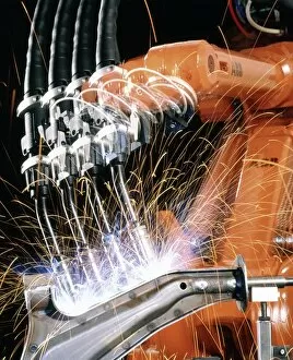 Images Dated 23rd September 1996: Robot arm spot-welding a car suspension u