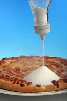 Salt content in pizza, conceptual image