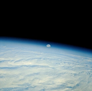 Images Dated 26th June 1990: Shuttle photograph of the moon over the earth
