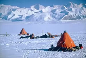 Skidoo maintenance, Antarctica, mountains