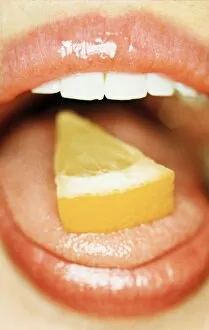 Slice of lemon on tongue