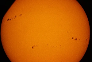 Solar disk showing a number of sunspots Solar disk showing a number of sunspots