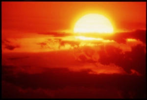 Sunset Cloud Formations Prints: Sun setting behind clouds