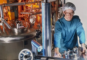 Technician working in a drug production factory Technician working in a drug production factory