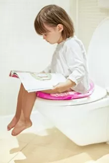 Bobbed Hair Gallery: Toddler reading on the toilet