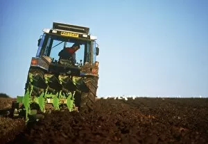 Images Dated 17th July 1998: View of a tractor ploughing a field
